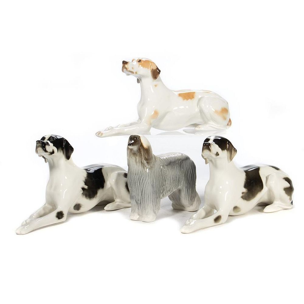 Appraisal: Russian Lomonosov Porcelain Group of Dogs Three figures including a