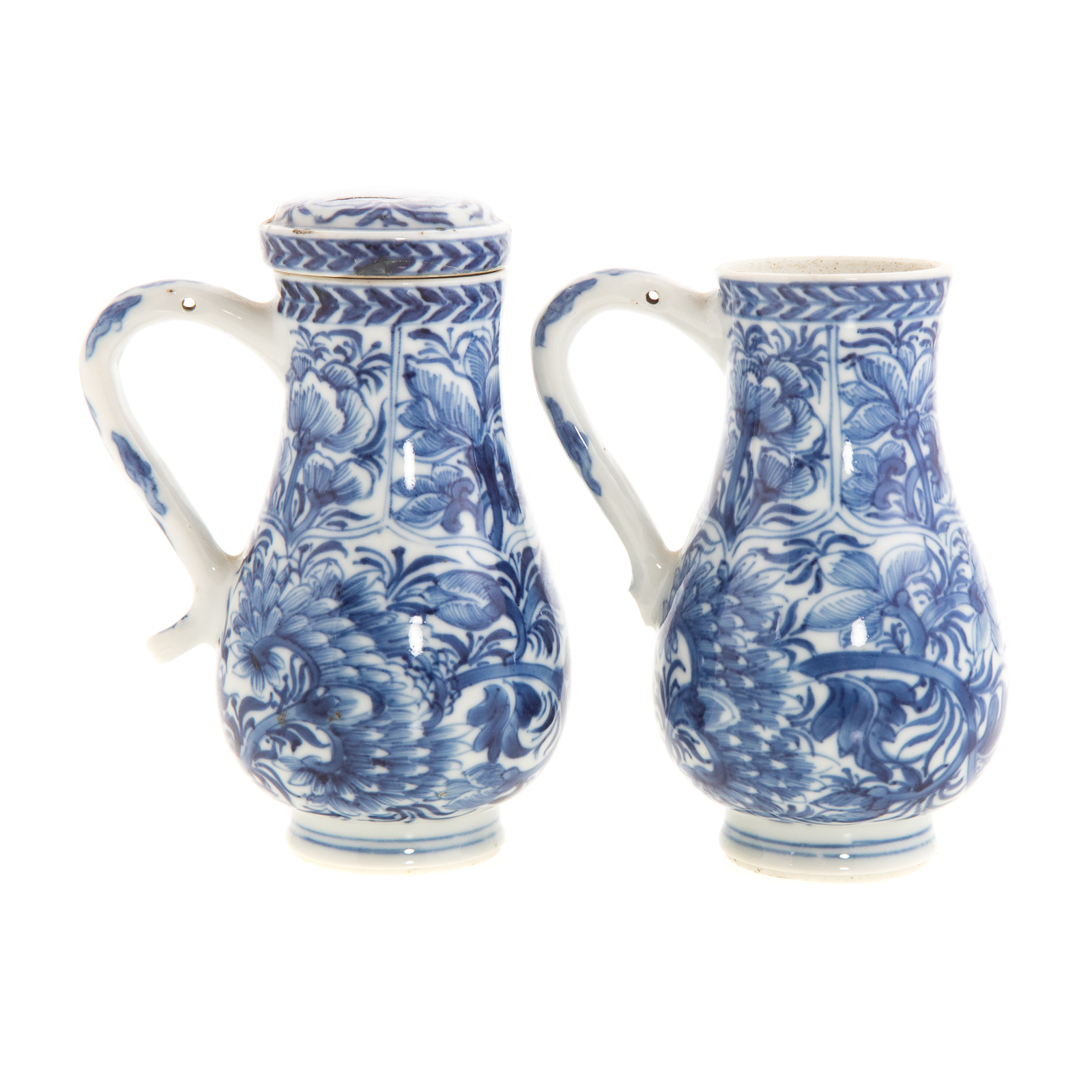 Appraisal: PAIR CHINESE EXPORT BLUE WHITE CREAM JUGS Kang Xi circa