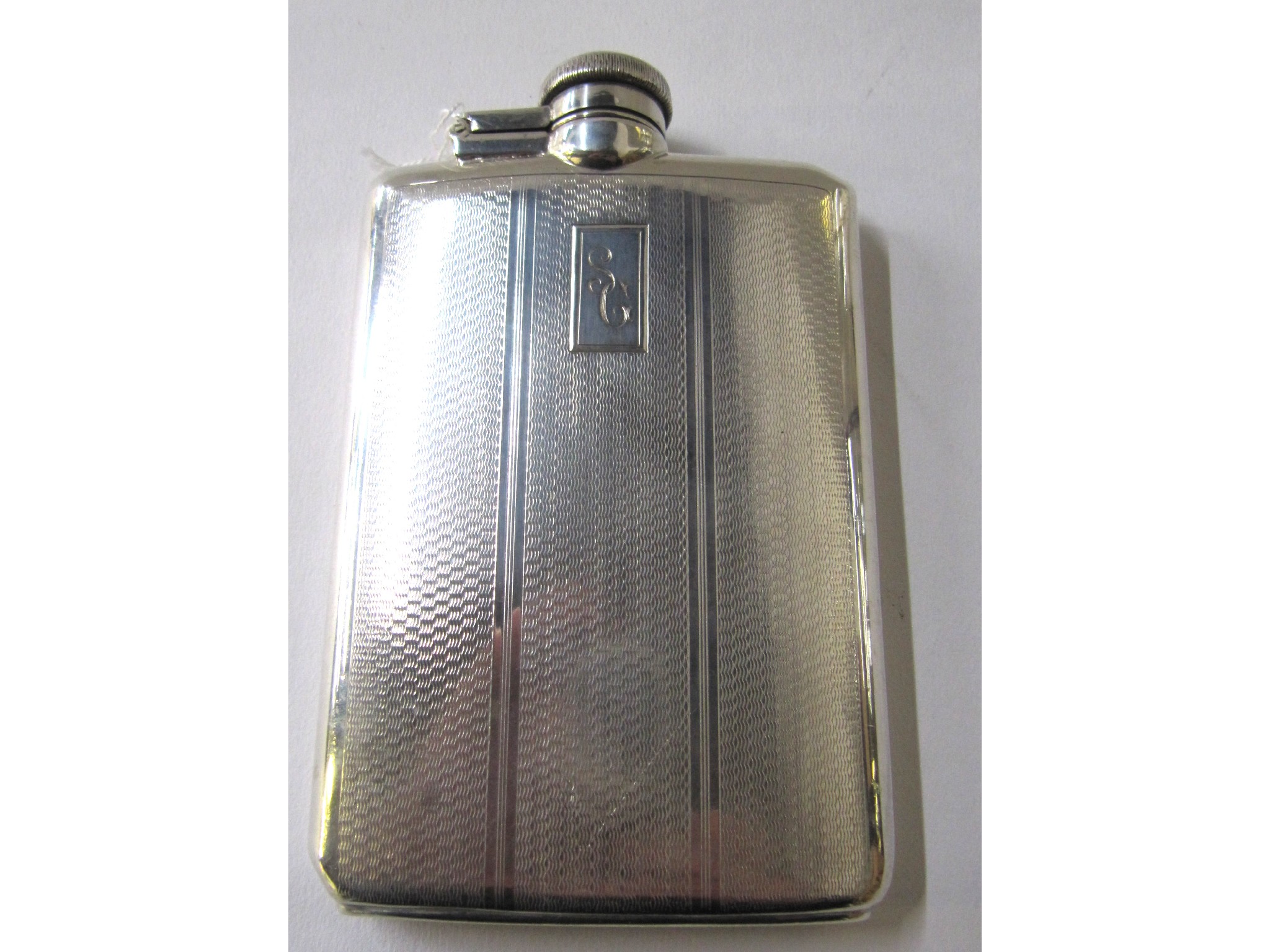 Appraisal: A white metal spirit flask