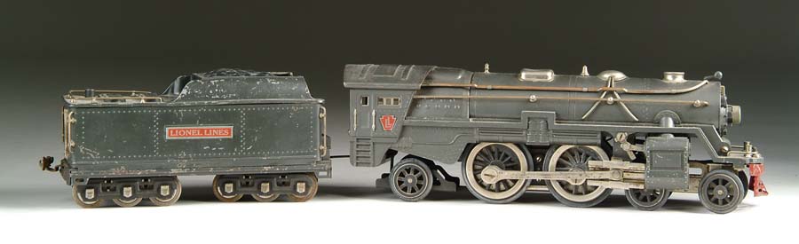 Appraisal: LIONEL E AND SIX-WHEELED TRUCK TENDER Trim work on boiler