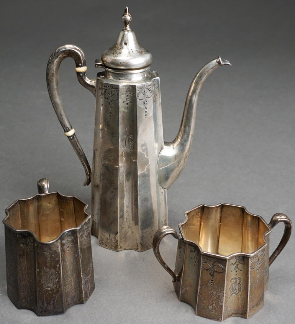 Appraisal: J WAGNER SON ENGRAVED HEXAGONAL STERLING SILVER THREE-PIECE DEMITASSE SET