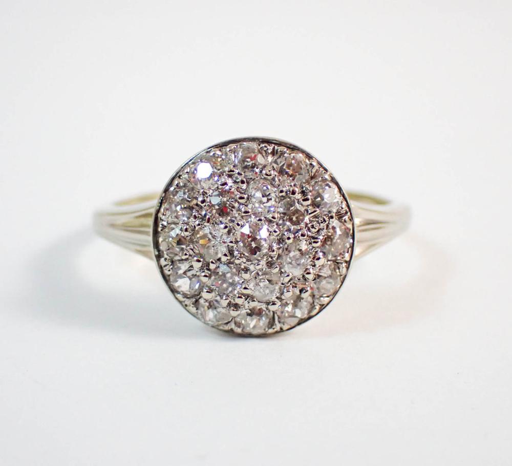 Appraisal: DIAMOND AND FOURTEEN KARAT WHITE GOLD RING with a round