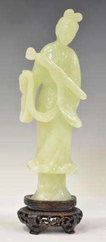 Appraisal: Chinese carved pale green hardstone female figure likely Guanyin holding