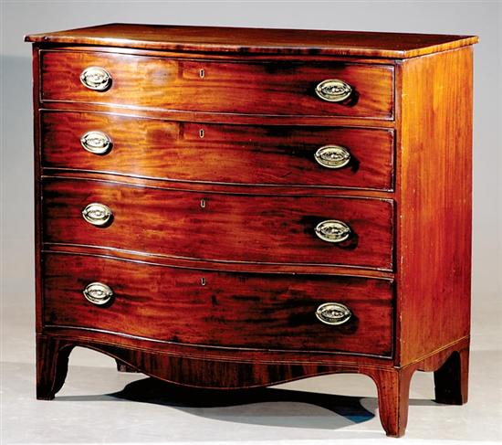 Appraisal: George III serpentine mahogany chest of drawers circa double-curved top