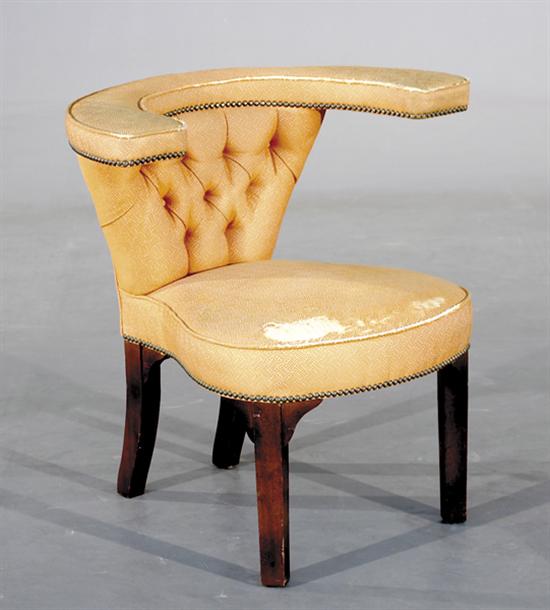 Appraisal: Mahogany and upholstered cock-fighting chair th century continuous arm over