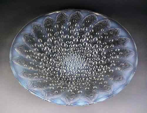 Appraisal: A Lalique blue opalescent moulded glass circular bowl of ''Roscoff''