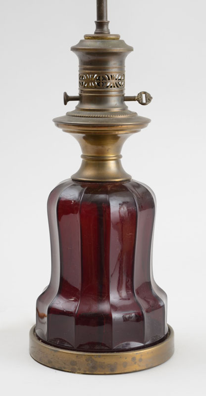 Appraisal: VICTORIAN BRASS-MOUNTED RUBY RED GLASS OIL LAMP in From the