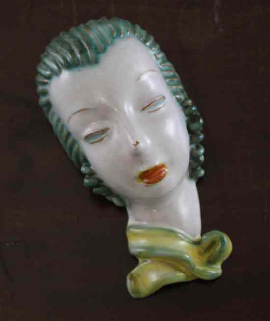 Appraisal: An Art Deco Goldscheider earthenware wall mask in Estimate -