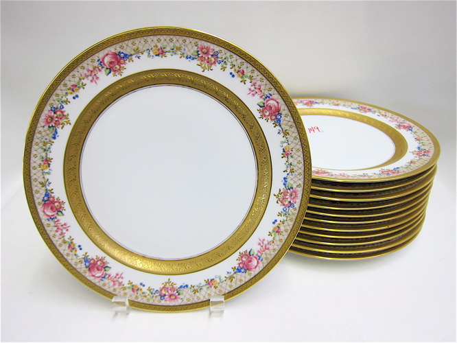 Appraisal: SET OF TWELVE CHARLES AHRENFELDT LIMOGES DINNER PLATES having encrusted