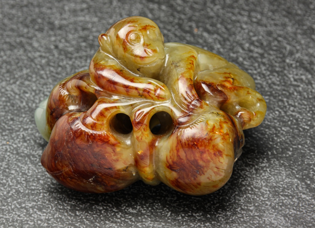 Appraisal: CHINESE JADE MONKEY CARVING Twentieth century Monkey and peaches in