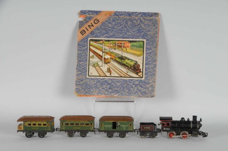 Appraisal: Bing O-Gauge Clockwork Passenger Set Description Pre-war Includes Bing clockwork