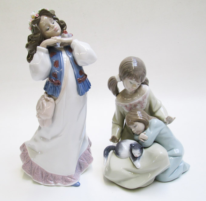 Appraisal: TWO LLADRO PORCELAIN FIGURINES Dreams of a Summer Past sculptor