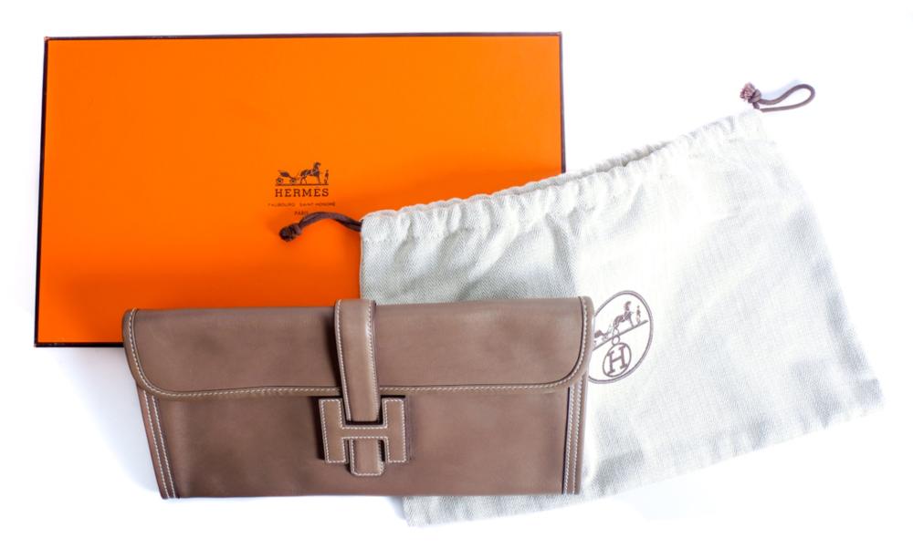 Appraisal: HERMES JIGE ELAN CLUTCH ETOUPEThis stylish clutch is crafted of