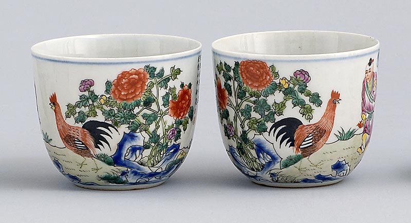 Appraisal: PAIR OF FAMILLE ROSE PORCELAIN TEACUPS Decorated with rooster figure