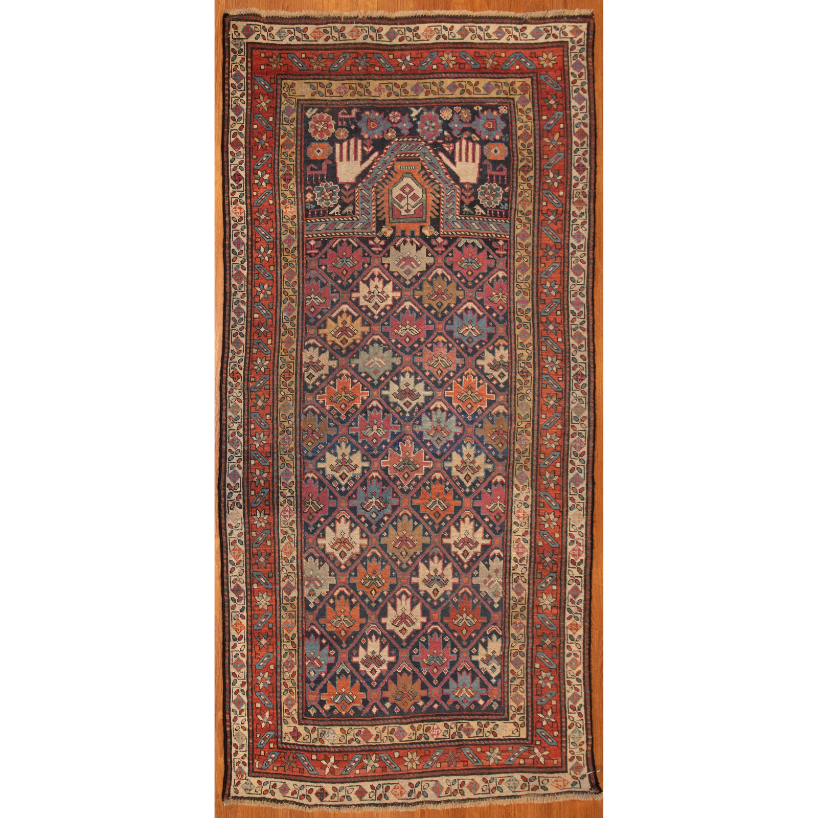 Appraisal: ANTIQUE CAUCASIAN PRAYER RUG X First quarter- th century hand-knotted