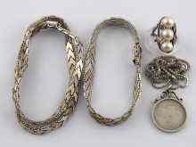 Appraisal: An Italian white metal tests silver necklace and bracelet a