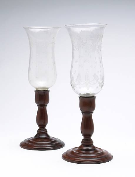 Appraisal: An assembled pair of turned wood and etched glass hurricane