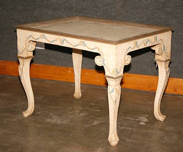 Appraisal: An Italian Rococo style paint decorated tray top center table