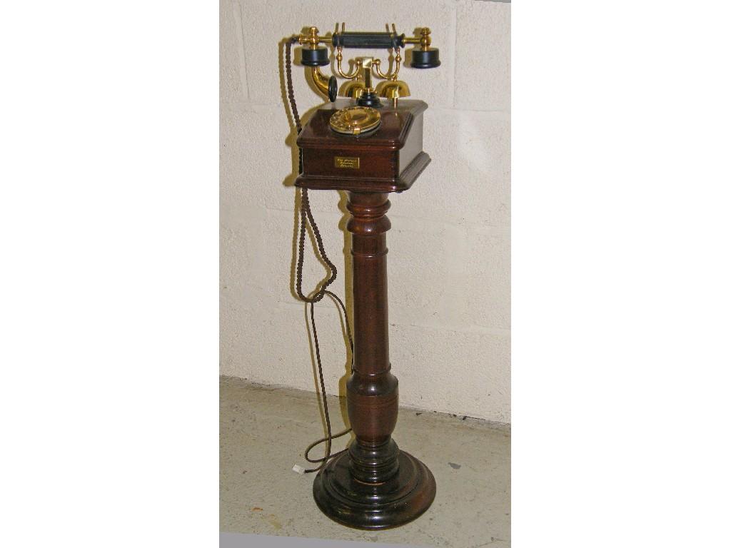 Appraisal: Replica mahogany and brass telephone on stand consisting of brass