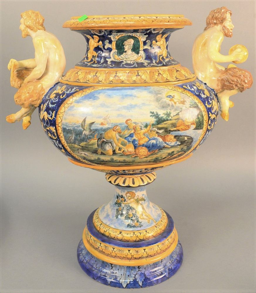 Appraisal: Large Majolica figural urn having mythical faun on each side