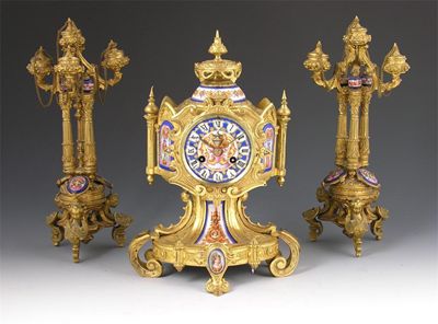 Appraisal: A French porcelain mounted ormolu clock garniture the striking movement