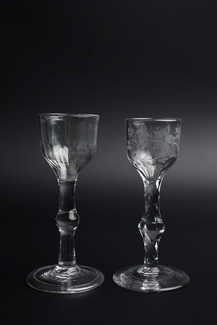 Appraisal: AN TH CENTURY WINE GLASS with partly moulded bowl on