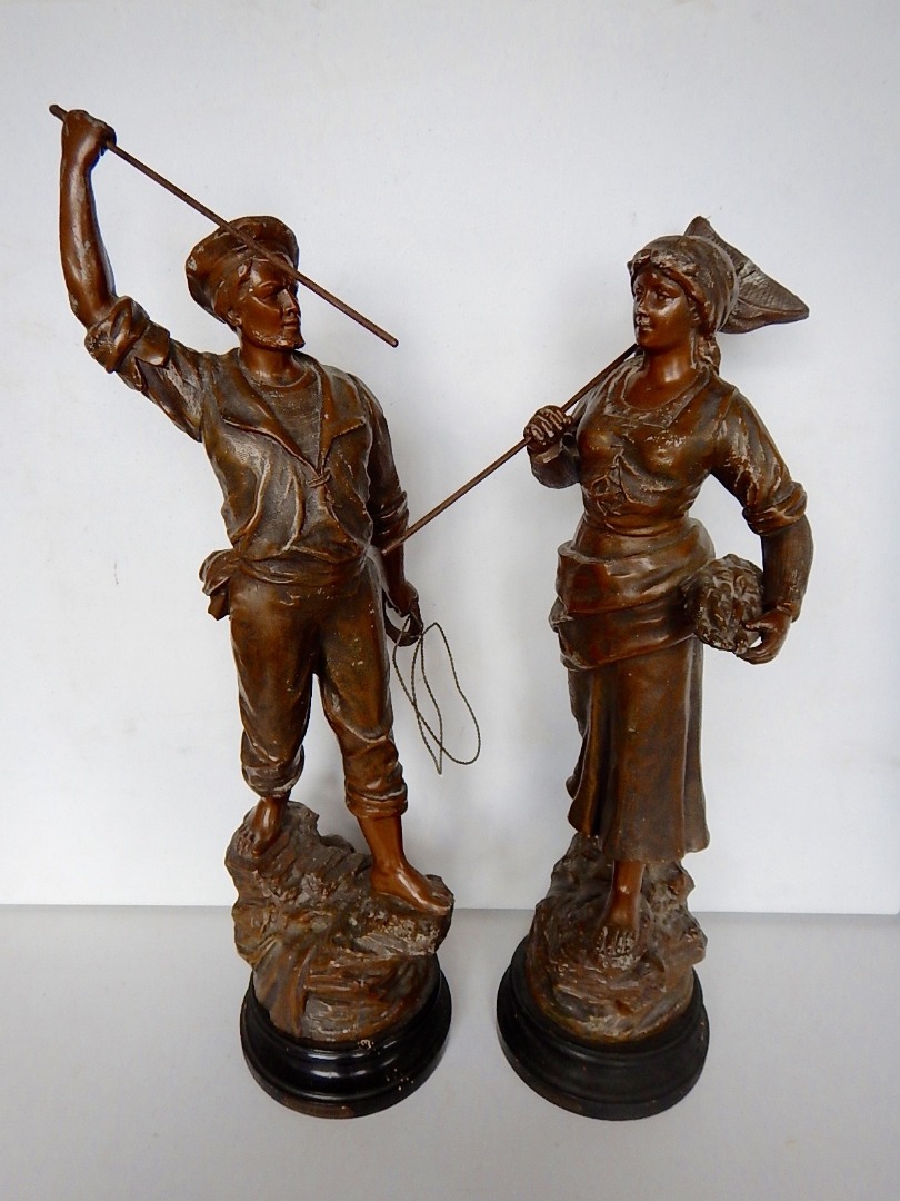 Appraisal: A pair of late thC bronze patinated spelter figures entitled