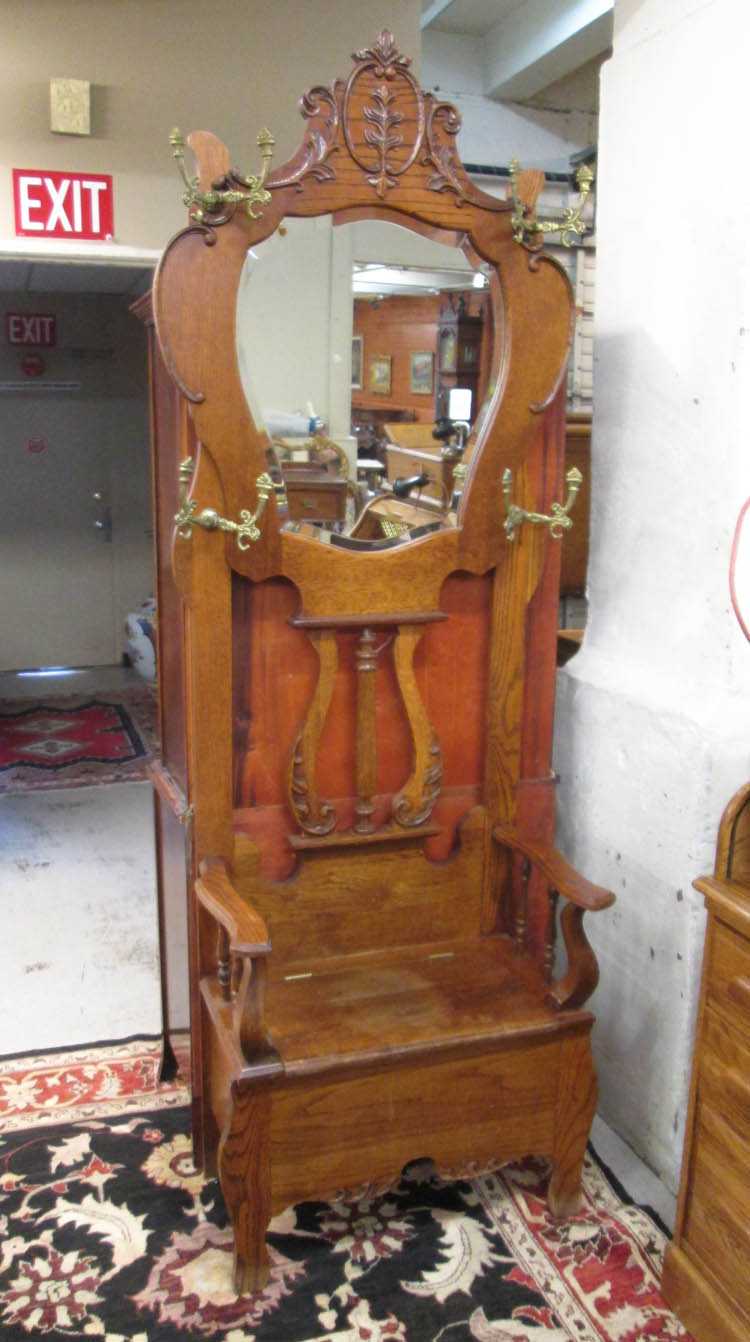 Appraisal: LATE VICTORIAN STYLE OAK SETTLE-BASE HALLSTAND American late th century