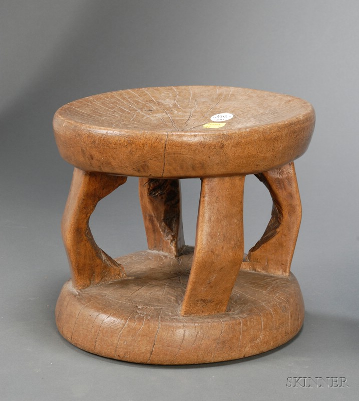 Appraisal: Carved Wood Stool Continental th century circular top supported on