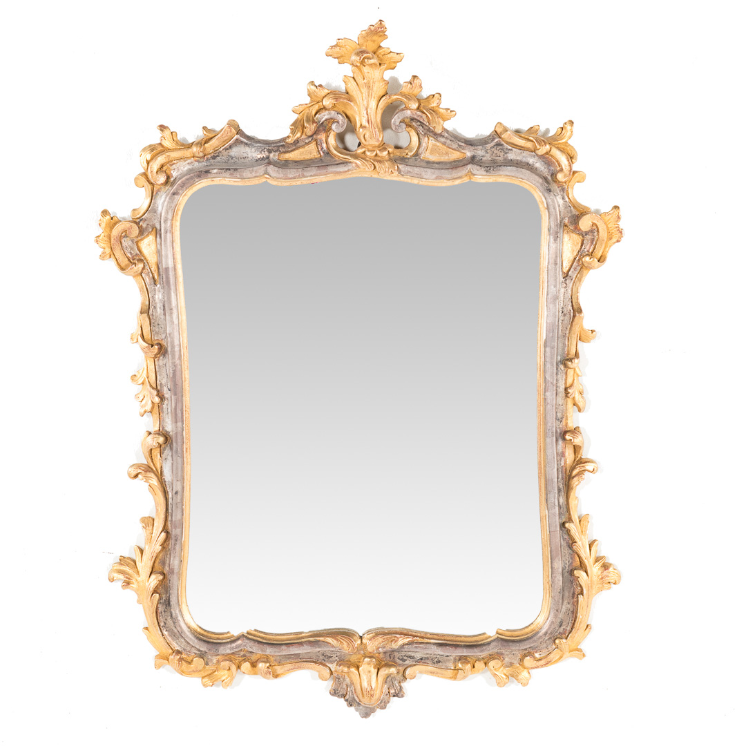 Appraisal: Italian Rococo style gilt and silvered wood mirror th century