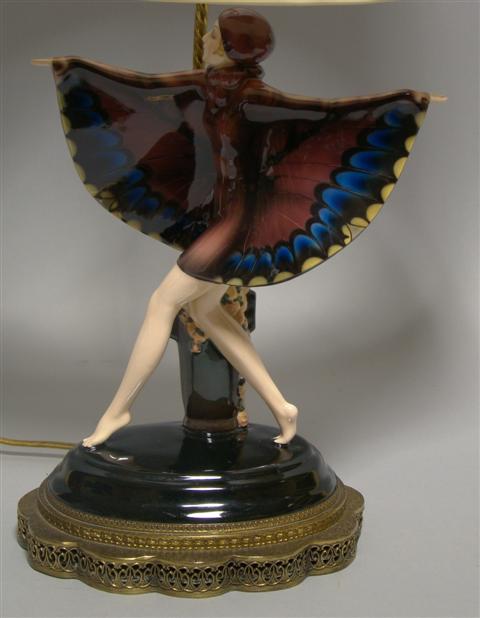 Appraisal: GOLDSCHEIDER FIGURE THE CAPTURED BIRD Designed by J Lorenzl c