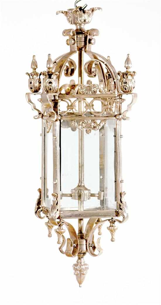 Appraisal: Continental silverplate hall lantern scrolling frame enclosing beveled glass panels