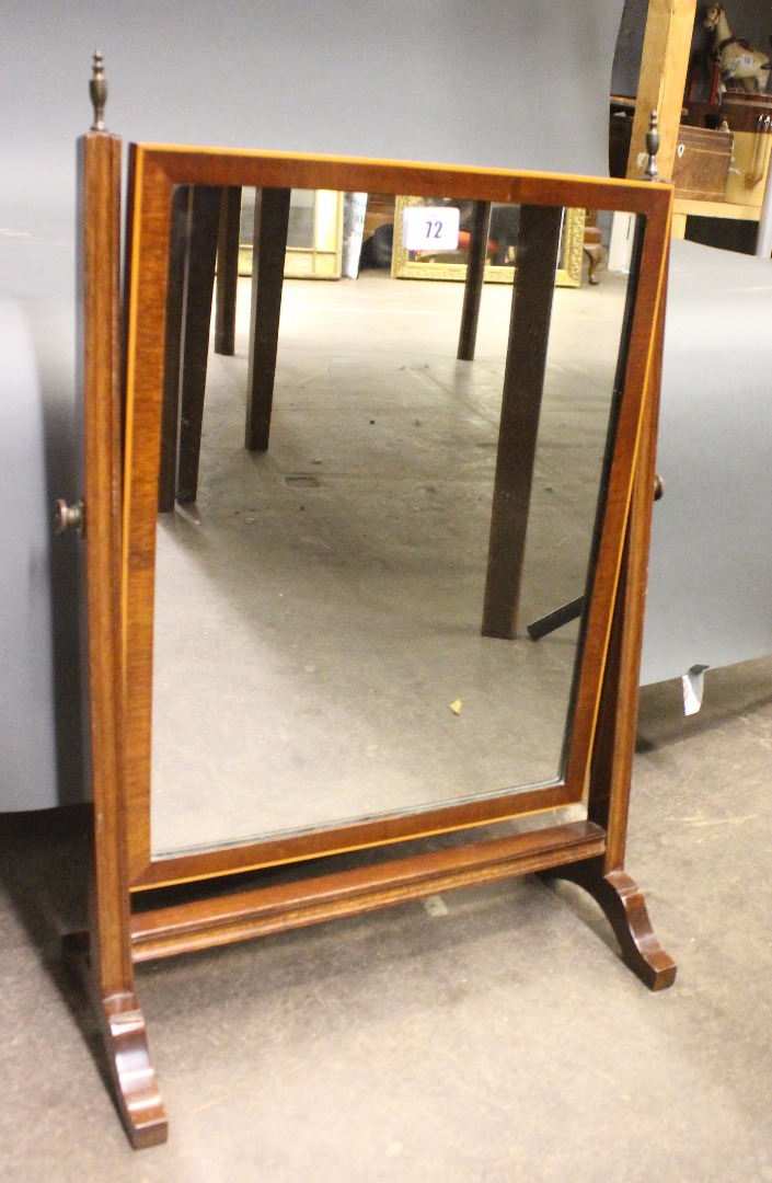 Appraisal: Two reproduction George III style mahogany boxwood strung toilet mirrors