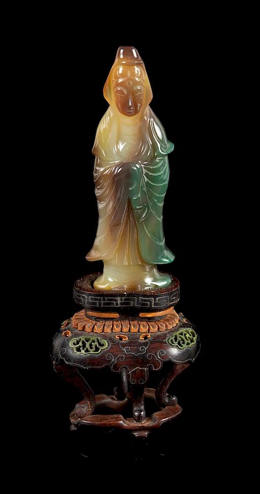 Appraisal: A Carved Agate Figure of Guanyin Height inches A Carved