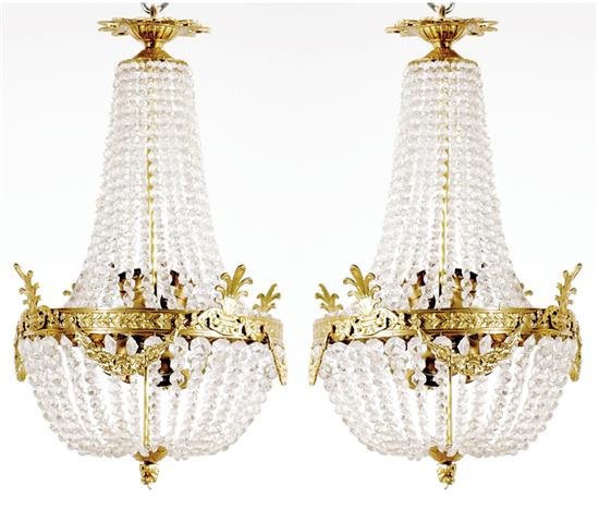 Appraisal: Pair gilt-metal and glass chandeliers chains of glass beads unifying