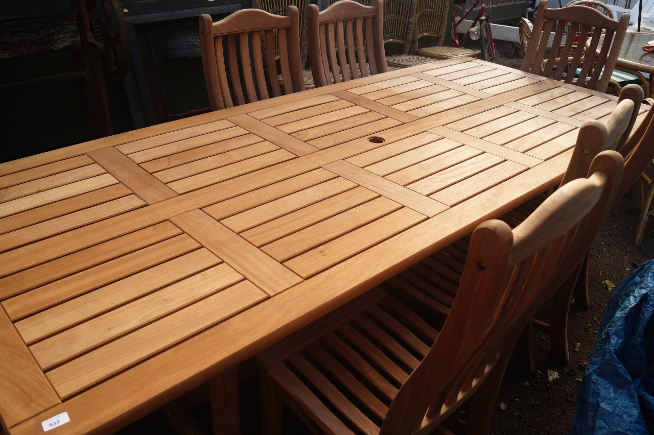 Appraisal: A teak slat top patio table of large proportion and