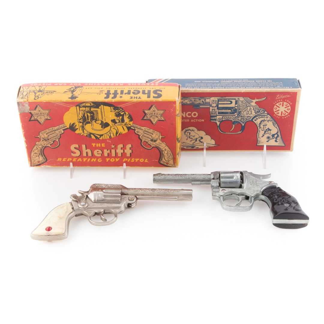 Appraisal: Stevens Sheriff and Kilgore Bronco cap guns with boxes Condition