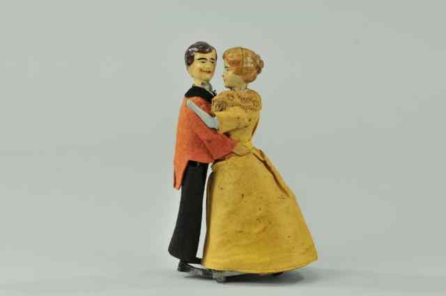 Appraisal: FERNAND MARTIN WALTZING COUPLE France hand painted tin figures each