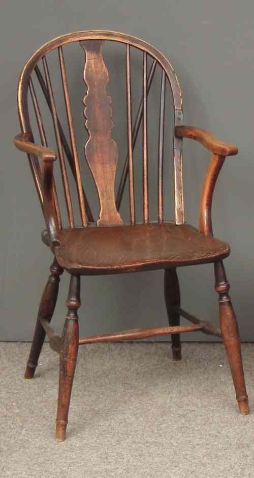 Appraisal: A th Century ash fruitwood and elm seated Windsor armchair