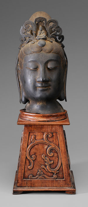 Appraisal: Bronze Guanyin Head Chinese th century tranquil face with downcast