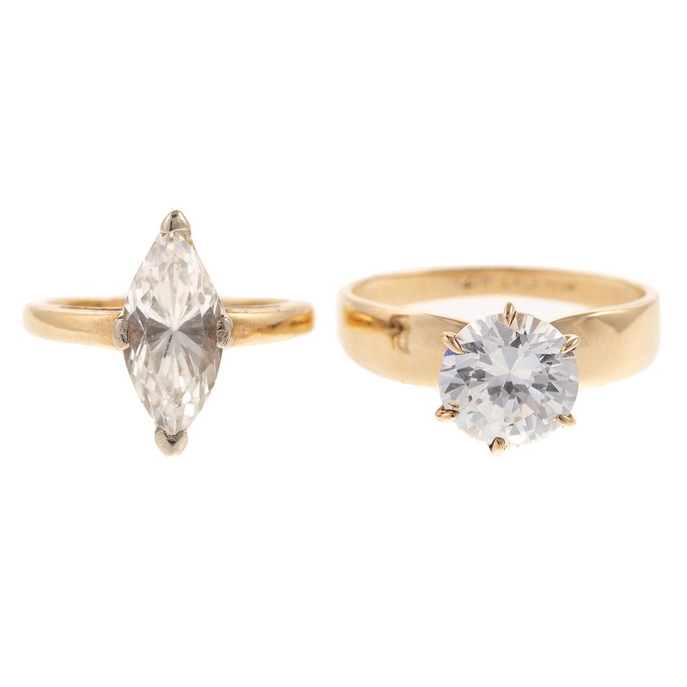 Appraisal: Two Large CZ Rings in Gold K yellow gold ring