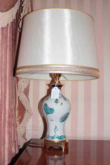 Appraisal: A CONTINENTAL PORCELAIN AND GILT METAL MOUNTED TABLE LAMP in