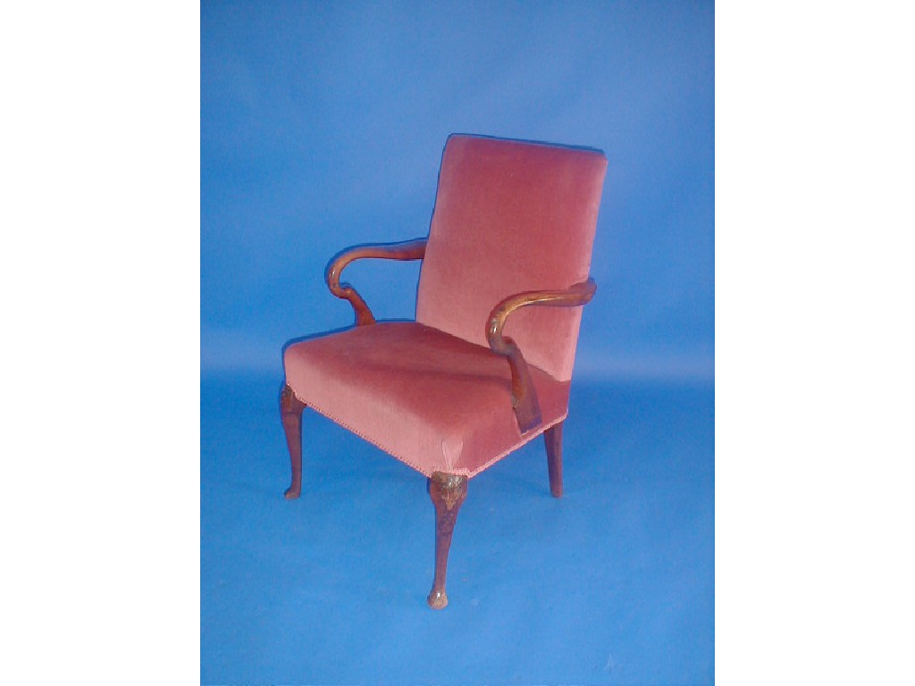 Appraisal: An thC walnut upholstered chair with crook arms and cabriole