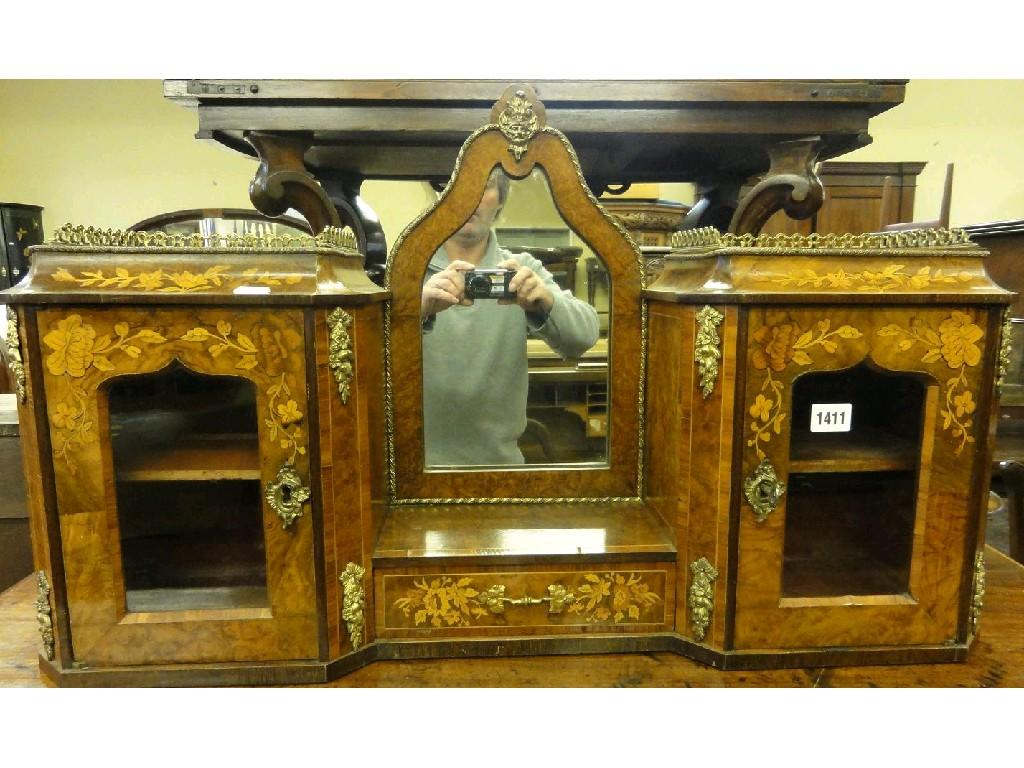 Appraisal: A Victorian figured walnut veneered table cabinet enclosed by a