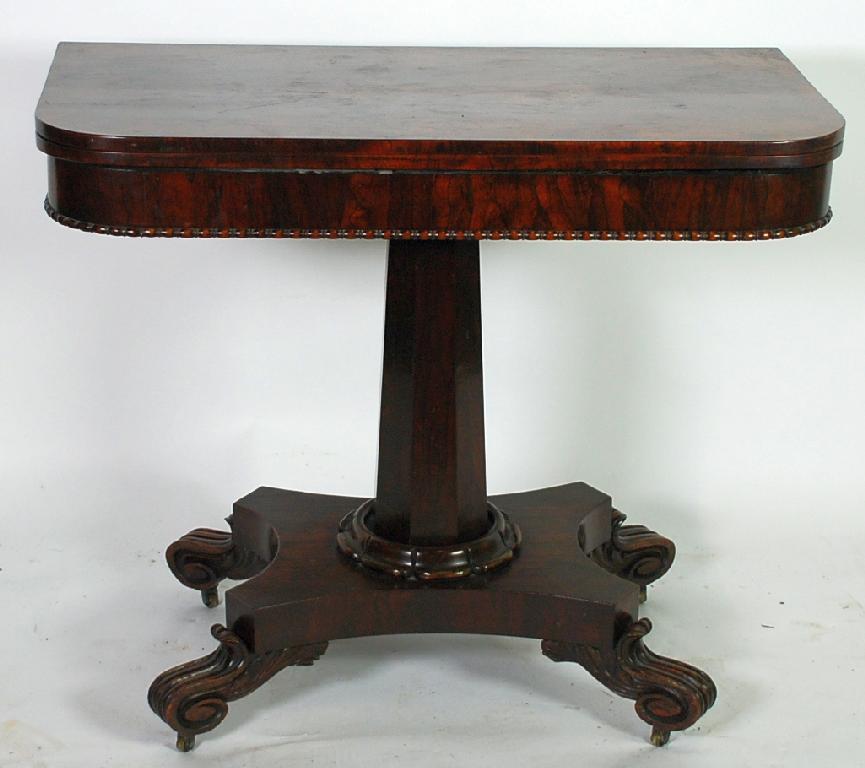 Appraisal: WILLIAM IV ROSEWOOD PEDESTAL TEA TABLE the rounded oblong swivel