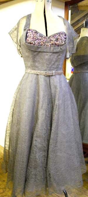 Appraisal: 's grey lace evening dress with sequinned bodice and matching