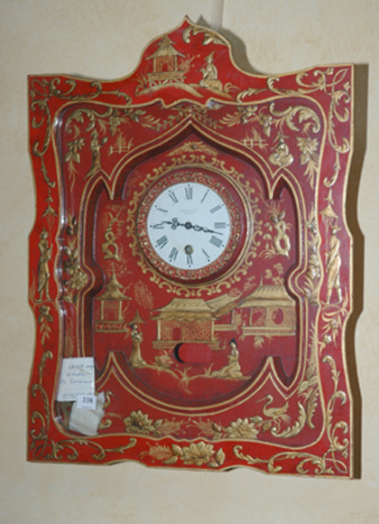 Appraisal: A CHINOISERIE RED LACQUERED WALL CLOCK Signed Carson Co London