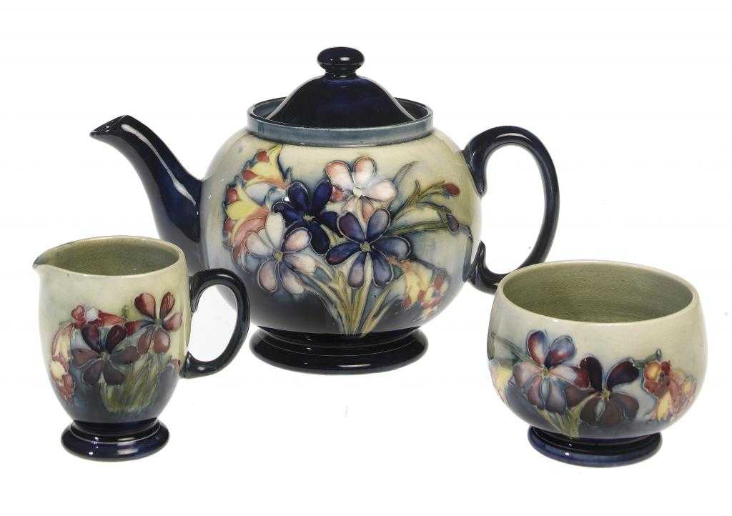 Appraisal: A MOORCROFT SPRING FLOWERS TEA SERVICE DESIGNED BY WILLIAM MOORCROFT