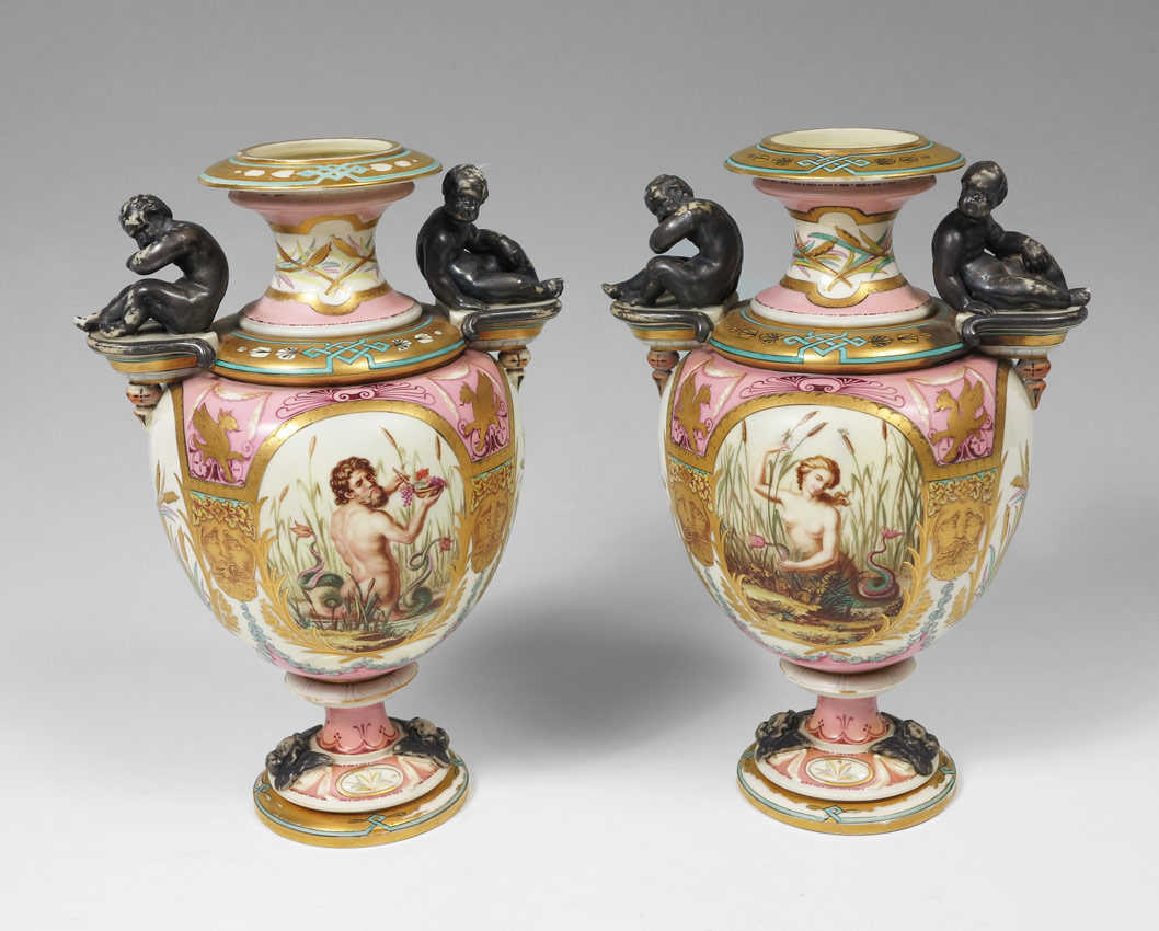 Appraisal: PAIR ROYAL WORCESTER PORCELAIN VASES Rich with mystical images bracket