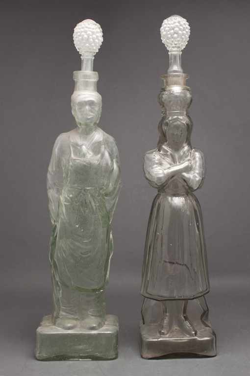 Appraisal: Pair of mold blown glass figural decanters Estimate - All